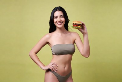 Woman holding burger