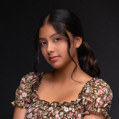 Young Latina girl in floral top