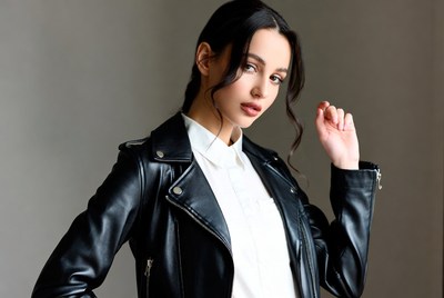 Woman in black leather jacket