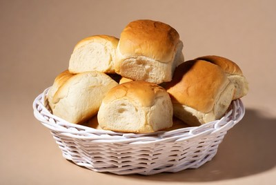 Fresh Dinner Rolls in White Basket