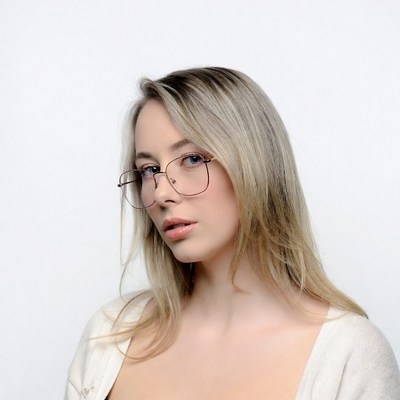 Blonde woman in glasses profile view