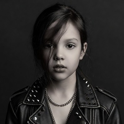 Girl in studded leather jacket