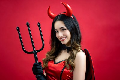 Asian woman in devil costume