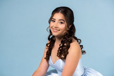 Latina girl in blue tutu dress