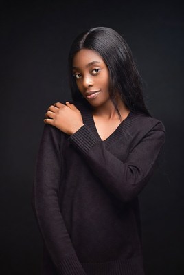 African-American woman in black sweater