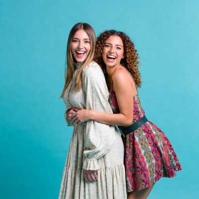 Two women hugging and smiling