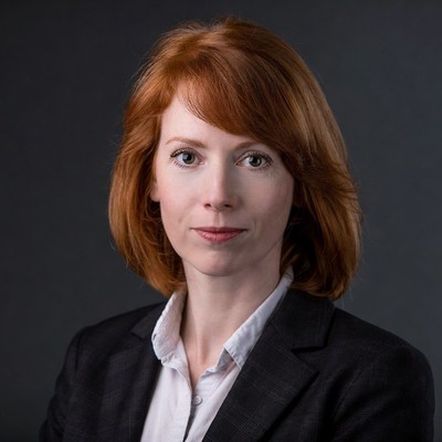 Redhead woman in business suit