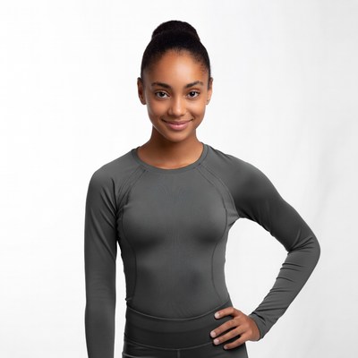 Smiling African-American girl in gray athletic wear