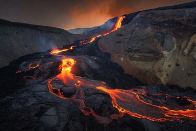 Lava Flowing Down Volcanic Mountainside