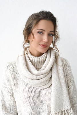 Woman in white turtleneck sweater