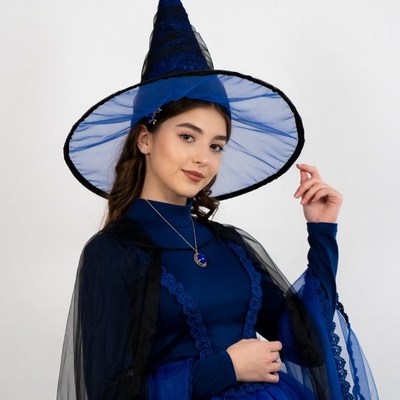 Girl in blue witch costume