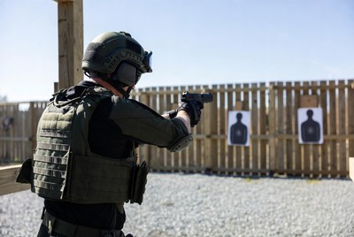 Soldier shooting pistol at targets