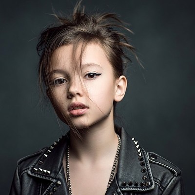 Girl in studded leather jacket