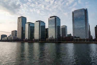 Modern Skyscrapers Reflecting in River