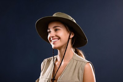 Smiling woman wearing safari hat