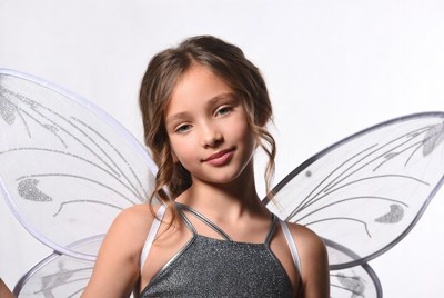 Girl with glittery fairy wings