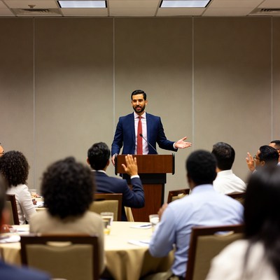 Man speaking at business conference