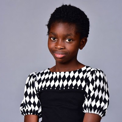 African girl in black white dress