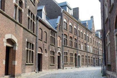 Historic Brick Buildings on Cobblestone Alley