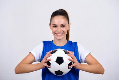 Woman holding soccer ball