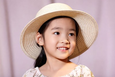 Asian girl wearing straw hat