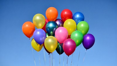 Colorful Balloons Against Blue Sky