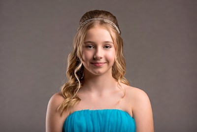 Girl in turquoise strapless dress