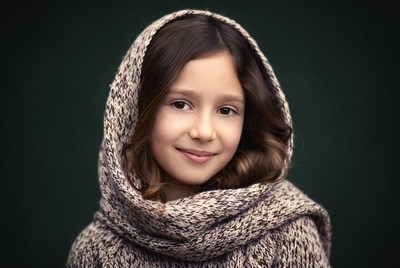 Girl smiling in hooded sweater