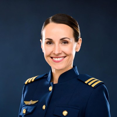 Smiling woman in pilot uniform