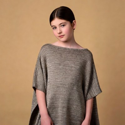 Teen girl in gray knit dress