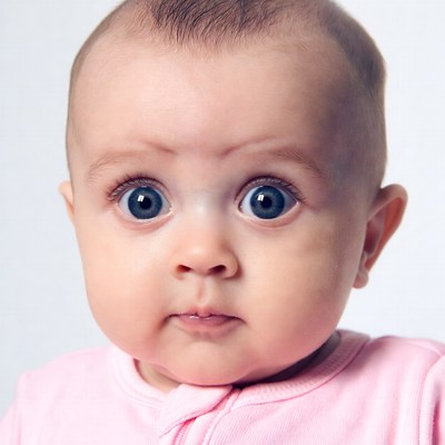 Baby with wide blue eyes