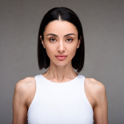Woman with bob haircut in white tank top