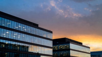 Modern Glass Office Buildings at Sunset