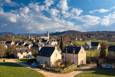 French village with church and hills