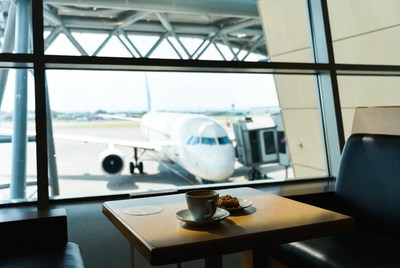 Coffee and pastry by airport window