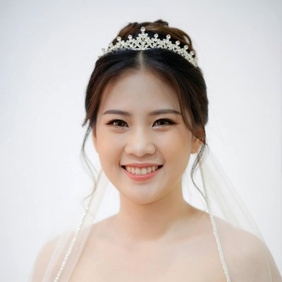 Asian bride with tiara and veil
