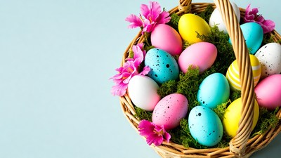 Colorful Easter eggs in wicker basket