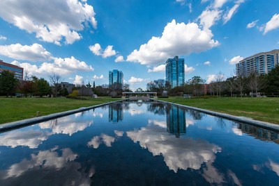 Reflecting Pool with Skyscrapers and Clouds