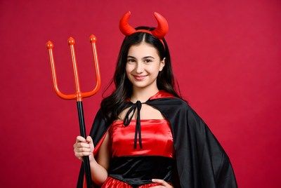 Girl in devil costume with trident