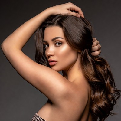 Beautiful woman touching hair