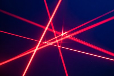 Red Laser Beams on Dark Background