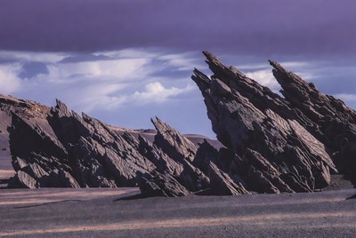 Jagged Rock Formations in Desert Landscape