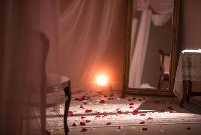 Romantic room with rose petals