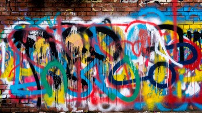 Colorful Graffiti on Brick Wall