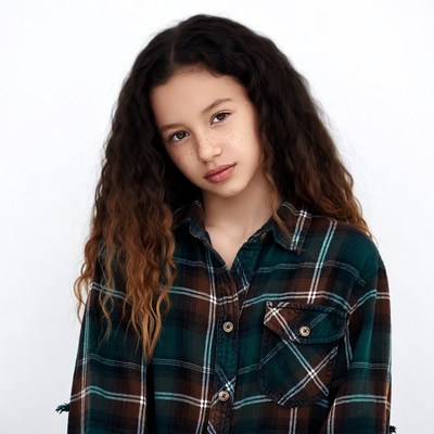 Teen girl in plaid shirt