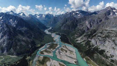 Aerial view turquoise river mountain valley