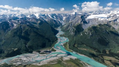 Turquoise River in Snowy Mountains