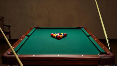 Pool table with racked billiard balls