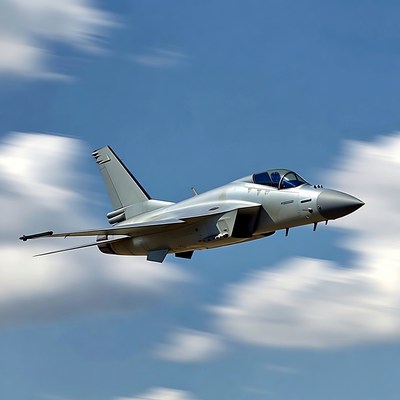Silver fighter jet flying in sky