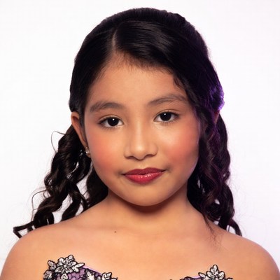 Young Asian girl with curly hair